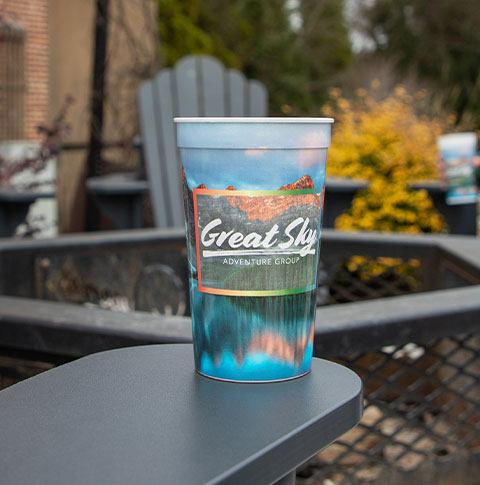 A plastic stadium cup with "Great Sky" logo